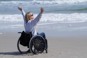 wheelchair-womean-celebrating-at-beacg